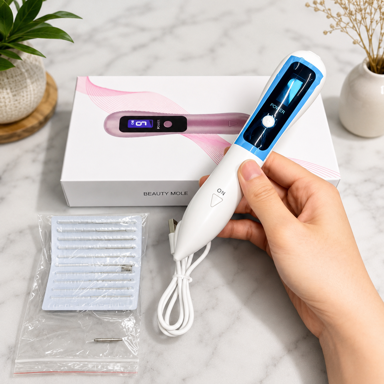 Máy đốt nốt ruồi cầm tay